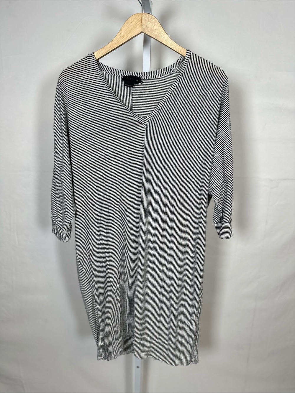 Hatch Black and White Striped V‑Neck Shift Dress